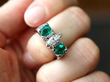 Marquise Diamond and Emerald Ring on finger