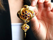 garnet gold tassel brooch