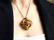 garnet gold pendant wearing