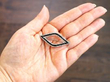 Cartier Black Onyx and Diamond Brooch in platinum