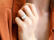 Opal Trilogy Ring in Yellow Gold being worn