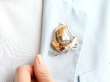 wearing diamond gold brooch