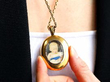gold locket wearing