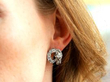 wearing platinum diamond earring