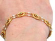Yellow Gold Peridot Bracelet being worn