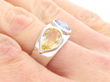 Yellow and Blue Pear Cut Sapphire Ring on Hand