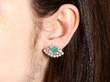 Wearing Art Deco Emerald and Diamond Earrings