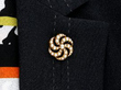Wearing Pearl Swirl Brooch in Yellow Gold