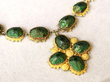 Scarab Beetle Necklace in Yellow Gold outside