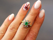 Square Cut Emerald Ring in Yellow Gold on finger