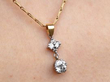 Diamond Drop Pendant Necklace in 9ct Gold on neck