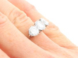 Round Brilliant Cut Diamond Trilogy Ring on hand