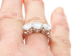 Round Brilliant Cut Diamond Trilogy Ring on finger