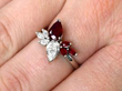 Pear Cut Ruby and Diamond Ring in White Gold on finger