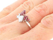 Pear Cut Ruby and Diamond Ring in White Gold on hand