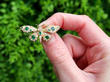 Vintage Emerald Butterfly Brooch in Gold outside
