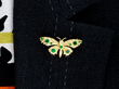 Vintage Emerald Butterfly Brooch in Gold wearing