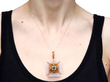 emerald agate pearl pendant being worn