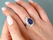 Wearing Pear Cut Sapphire Ring with Marquise Diamonds