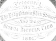 Antique Sterling Silver Cycling Medallion close up