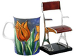 Rare Enamel and Silver Chair Ornament next to a mug