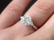 2.14 Carat Diamond Solitaire Ring with Trillion Side Stones on finger
