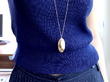 Oval Plain Gold Locket being worn