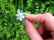 Jade and Diamond Floral Cocktail Ring in Outside Natural Lighting