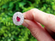 Oval Cut Ruby Ring with Double Diamond Halo In Natural Light