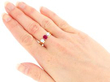 Wearing Vintage Ruby and Diamond Trilogy Ring in Yellow Gold