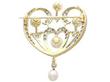back of pearl and diamond heart pendant in gold