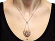 Wearing Heart Shaped Pearl and Diamond Pendant