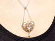 Heart Shaped Pearl and Diamond Pendant on Neck