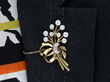 Diamond Ribbon Spray Brooch wearing