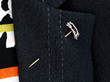 wearing a diamond pig brooch with diamonds