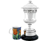 Victorian Silver Trophy Cup with Cover next to a mug
