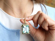 wearing aquamarine gold pendant