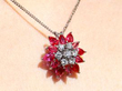 wearing Floral Pear Cut Ruby Pendant
