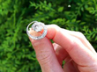 Diamond Twirl Earrings in White Gold outside
