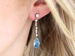 Antique aquamarine and diamond earring in ear