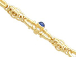 sapphire and diamond yellow gold gate bracelet setting