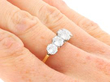 Wearing Diamond Five Stone Ring On Hand Close Up