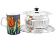 Georgian Biscuit Box in Sterling Silver next to a mug