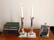 Silver Corinthian Column Candlesticks lit