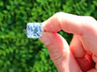 Cushion Cut Cornflower Sapphire Engagement Ring in Platinum outside