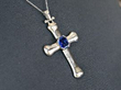 Vintage Sapphire Cross Pendant in Platinum being worn