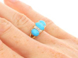 turquoise diamond yellow gold ring being worn