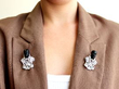 Art Deco diamond dyed quartz palladium brooches being worn