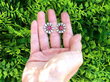 En Tremblant Setting Ruby and Diamond Day Earrings Outside