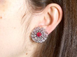 Wearing En Tremblant Setting Ruby and Diamond Earrings